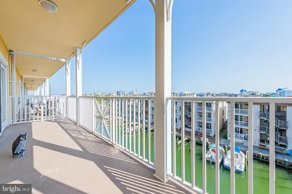 a view of a balcony with couches