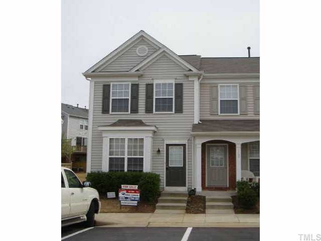 1734 Sorrell Brook Way Raleigh, NC 27609 - Photo 1 of 1 a front view of a house with parking space