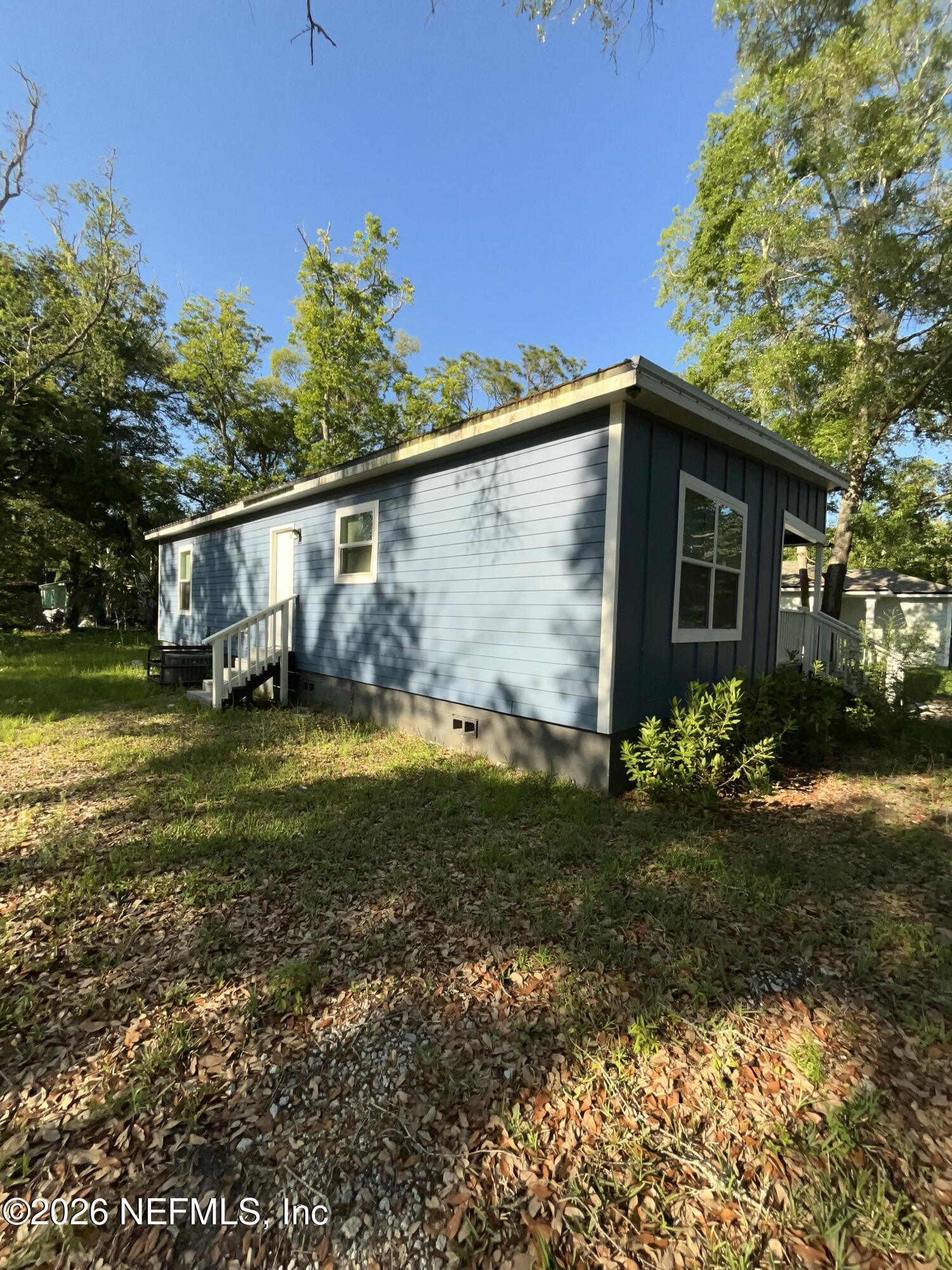 2017 Talladega Road Jacksonville, FL 32209 - Photo 4 of 34 a view of a house with a yard
