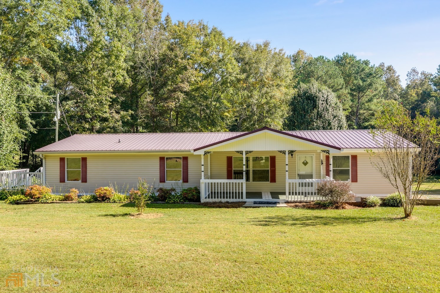 175 Hillcrest Road Bowdon, GA 30108 - Photo 1 of 1 a front view of a house with swimming pool and porch