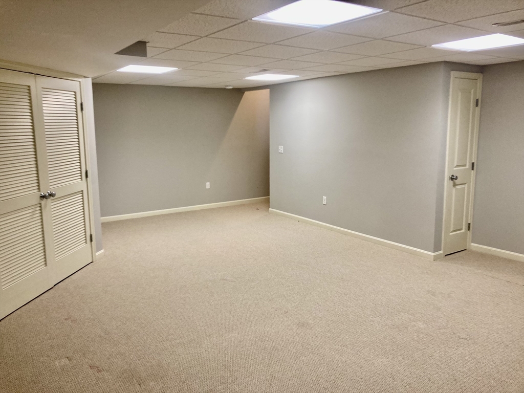 45 Turtle Brook Road, Unit 45 Canton, MA 02021 - Photo 12 of 14 an empty room with windows
