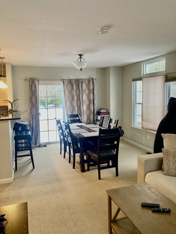 45 Turtle Brook Road, Unit 45 Canton, MA 02021 - Photo 4 of 14 a view of a dining room with furniture