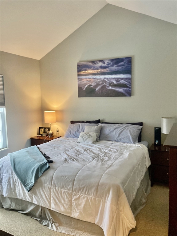 45 Turtle Brook Road, Unit 45 Canton, MA 02021 - Photo 6 of 14 a bedroom with a bed and cupboard