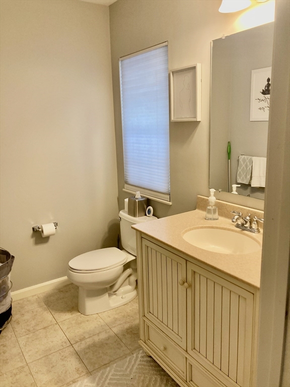 45 Turtle Brook Road, Unit 45 Canton, MA 02021 - Photo 7 of 14 a bathroom with a sink and a toilet
