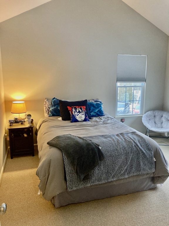 45 Turtle Brook Road, Unit 45 Canton, MA 02021 - Photo 8 of 14 a spacious bedroom with a bed and a couch