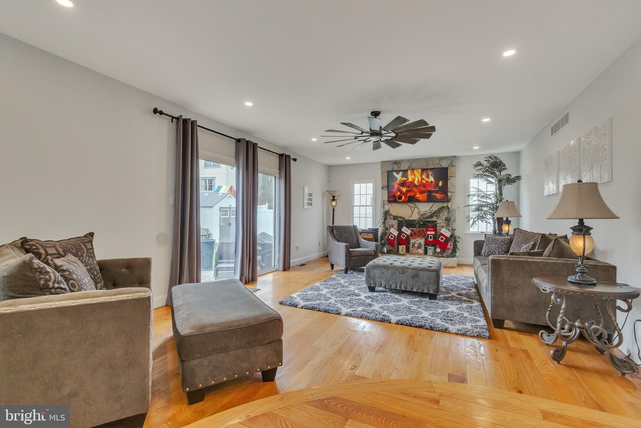 3 Bunning Drive Voorhees, NJ 08043 - Photo 11 of 31 a living room with furniture and a flat screen tv