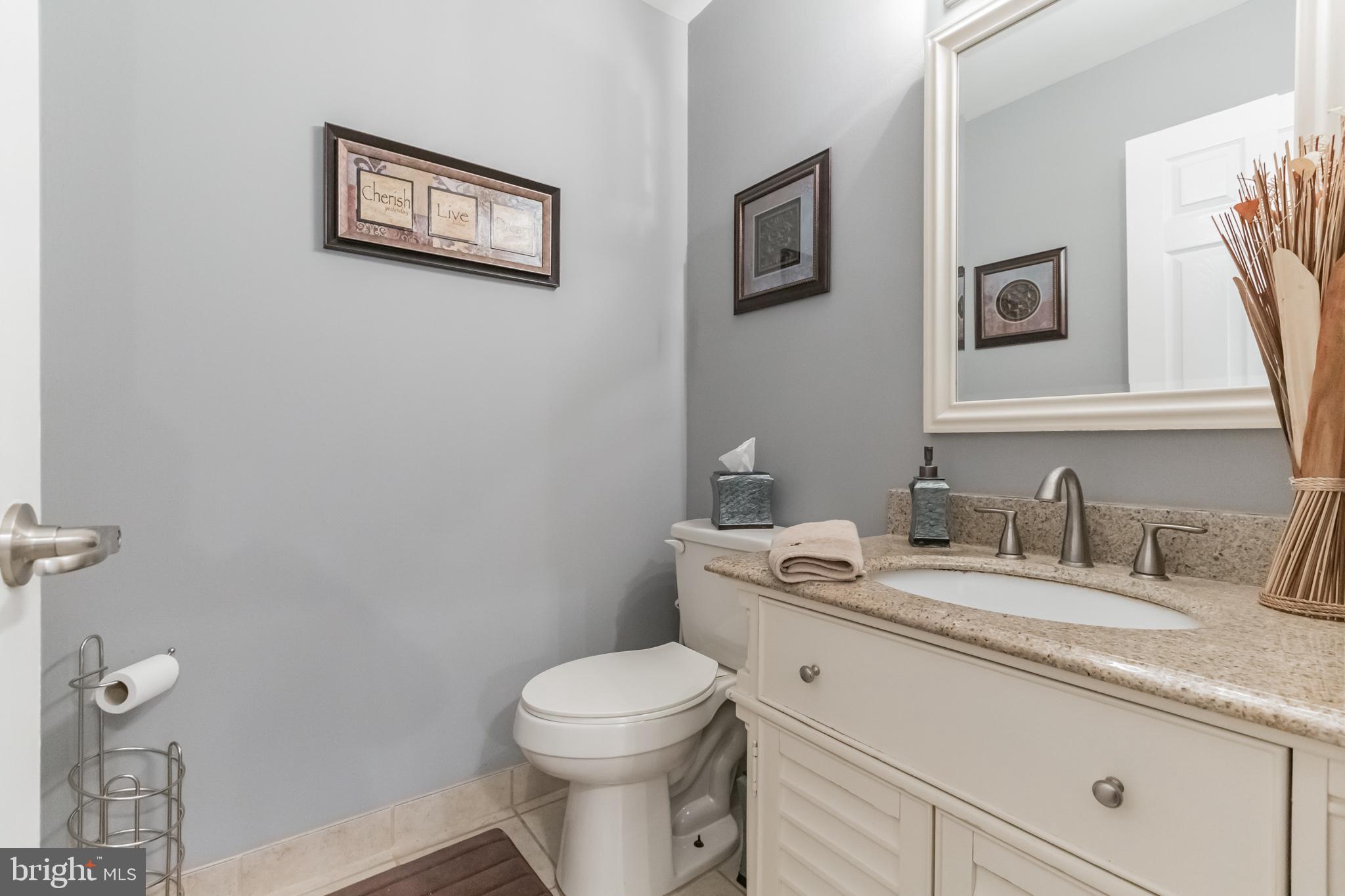3 Bunning Drive Voorhees, NJ 08043 - Photo 14 of 31 a bathroom with a granite countertop toilet sink and mirror
