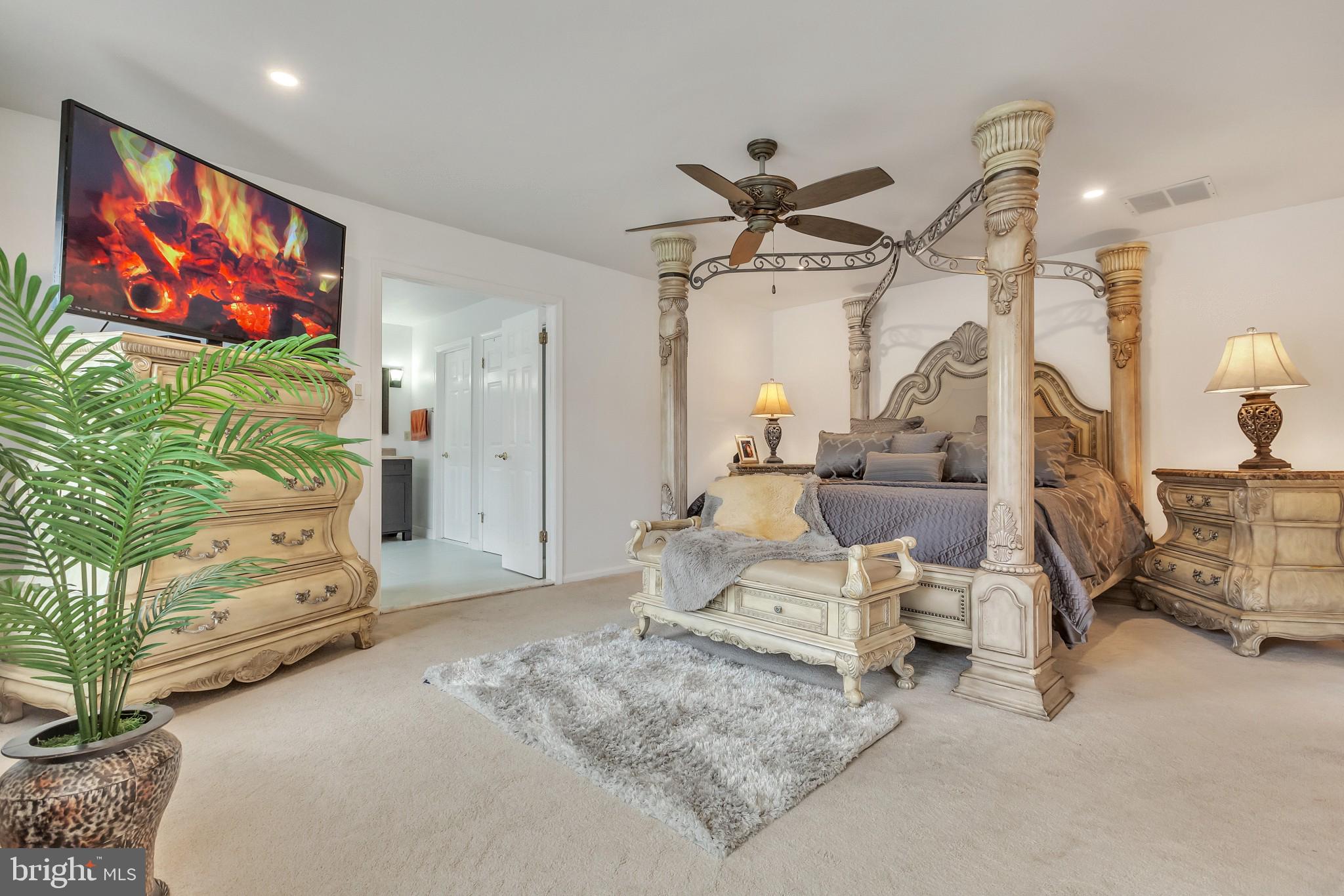 3 Bunning Drive Voorhees, NJ 08043 - Photo 15 of 31 a living room with furniture and a flat screen tv