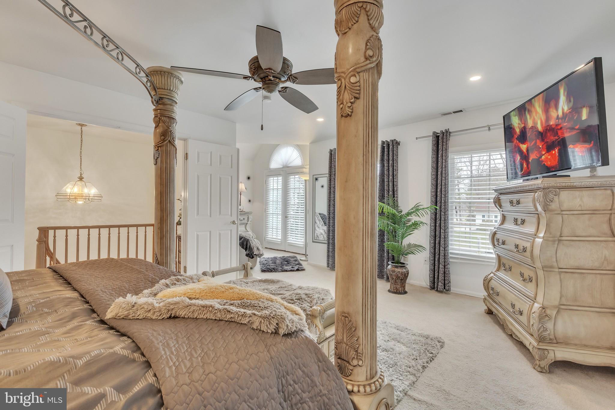 3 Bunning Drive Voorhees, NJ 08043 - Photo 17 of 31 a bedroom with a bed and a mirror