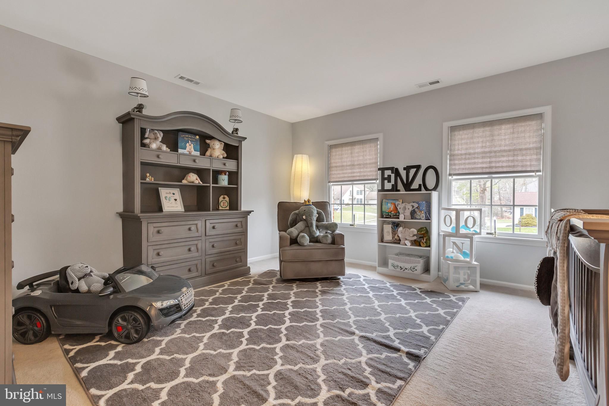 3 Bunning Drive Voorhees, NJ 08043 - Photo 20 of 31 a living room with furniture and a floor to ceiling window