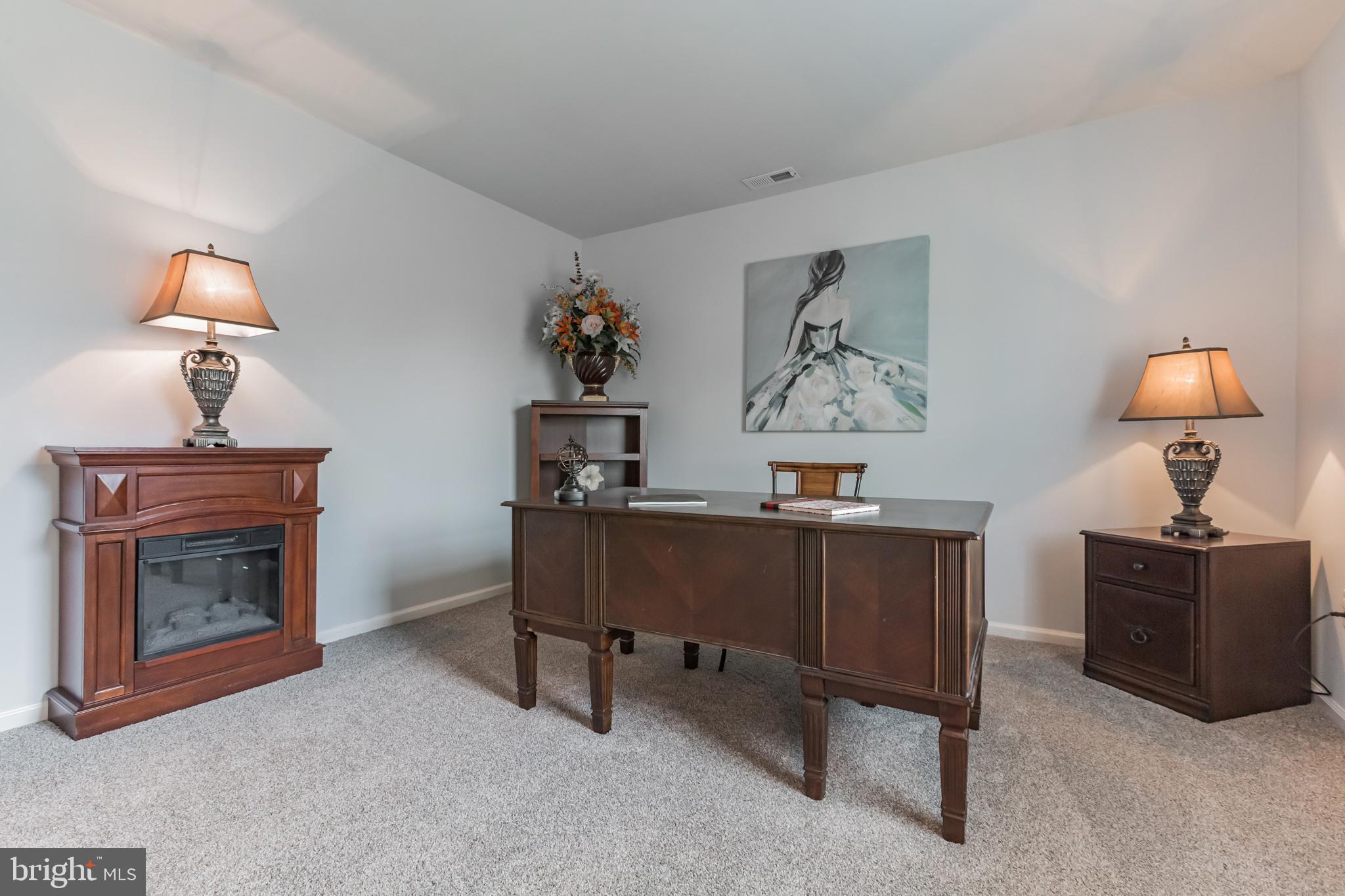 3 Bunning Drive Voorhees, NJ 08043 - Photo 21 of 31 a living room with furniture and a lamp