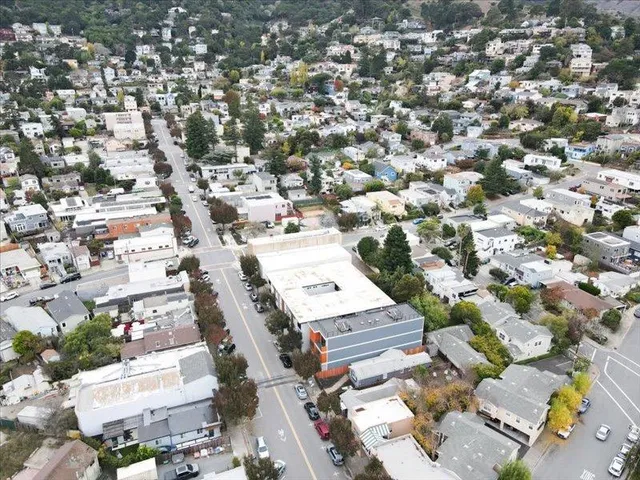 an aerial view of a city with lots of residential buildings
