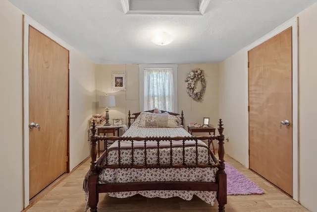 a view of a chairs and table in backyard