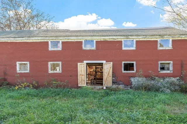 a view of a swimming pool with an outdoor seating