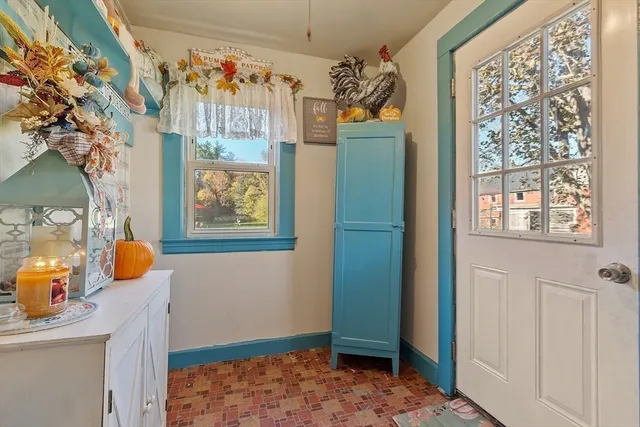 a view of a kitchen area with furniture and window
