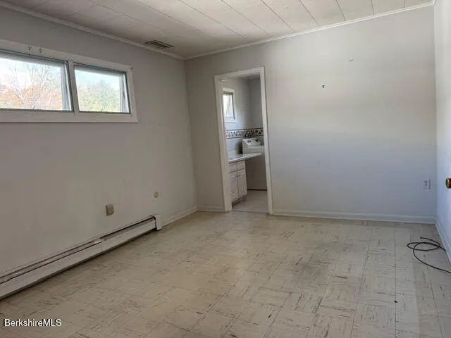 an empty room with windows