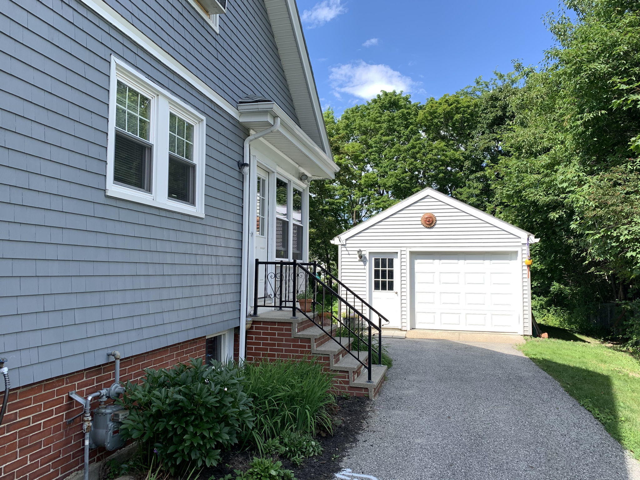 Side Entrance & 1 Car Garage