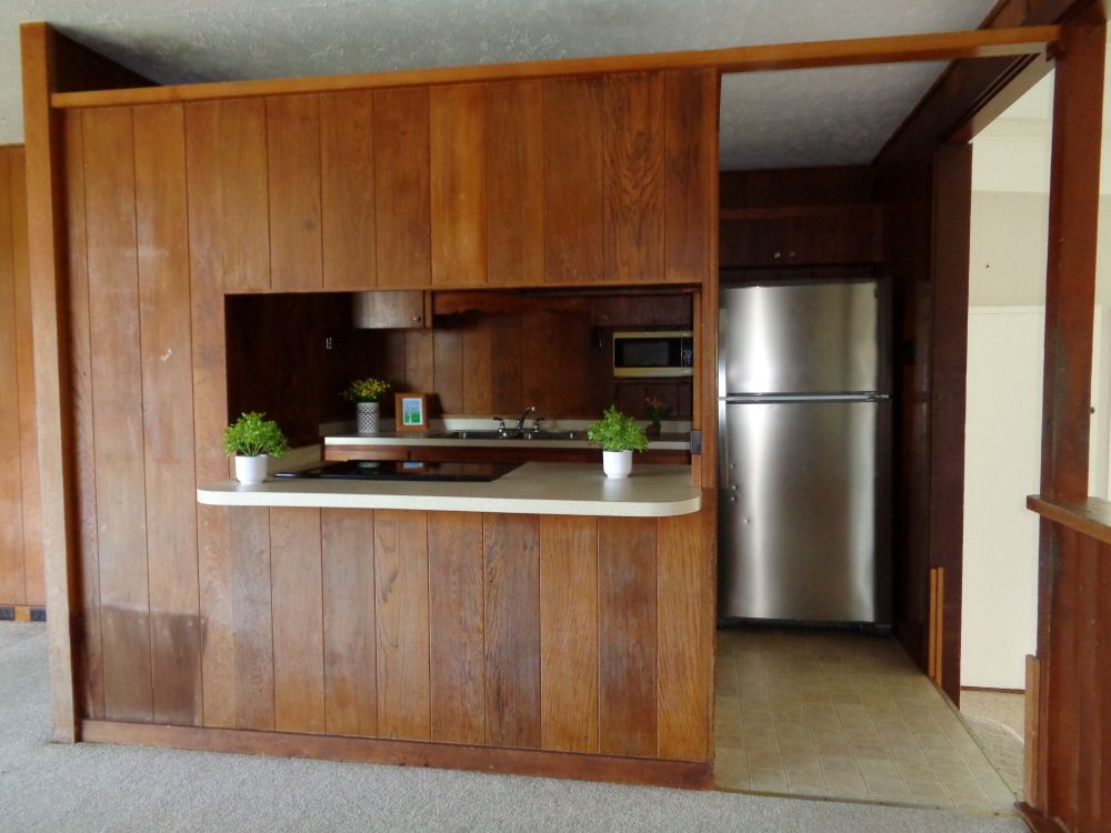 360 A Lama Street Hilo, HI 96720 - Photo 20 of 28 a kitchen with stainless steel appliances a refrigerator and a stove