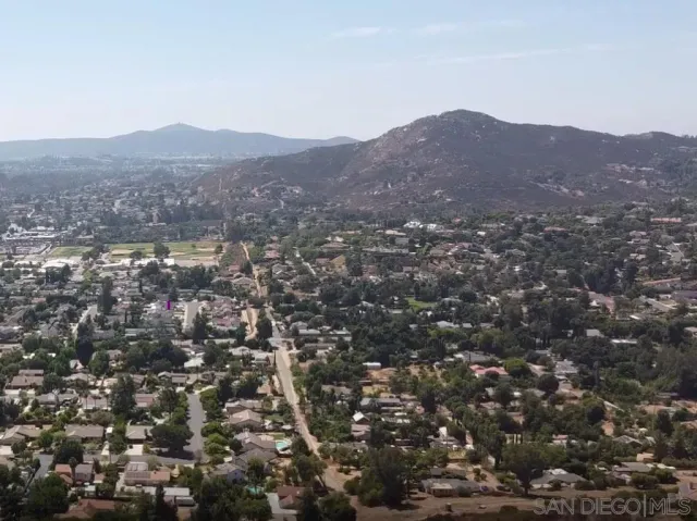 a view of city and mountains