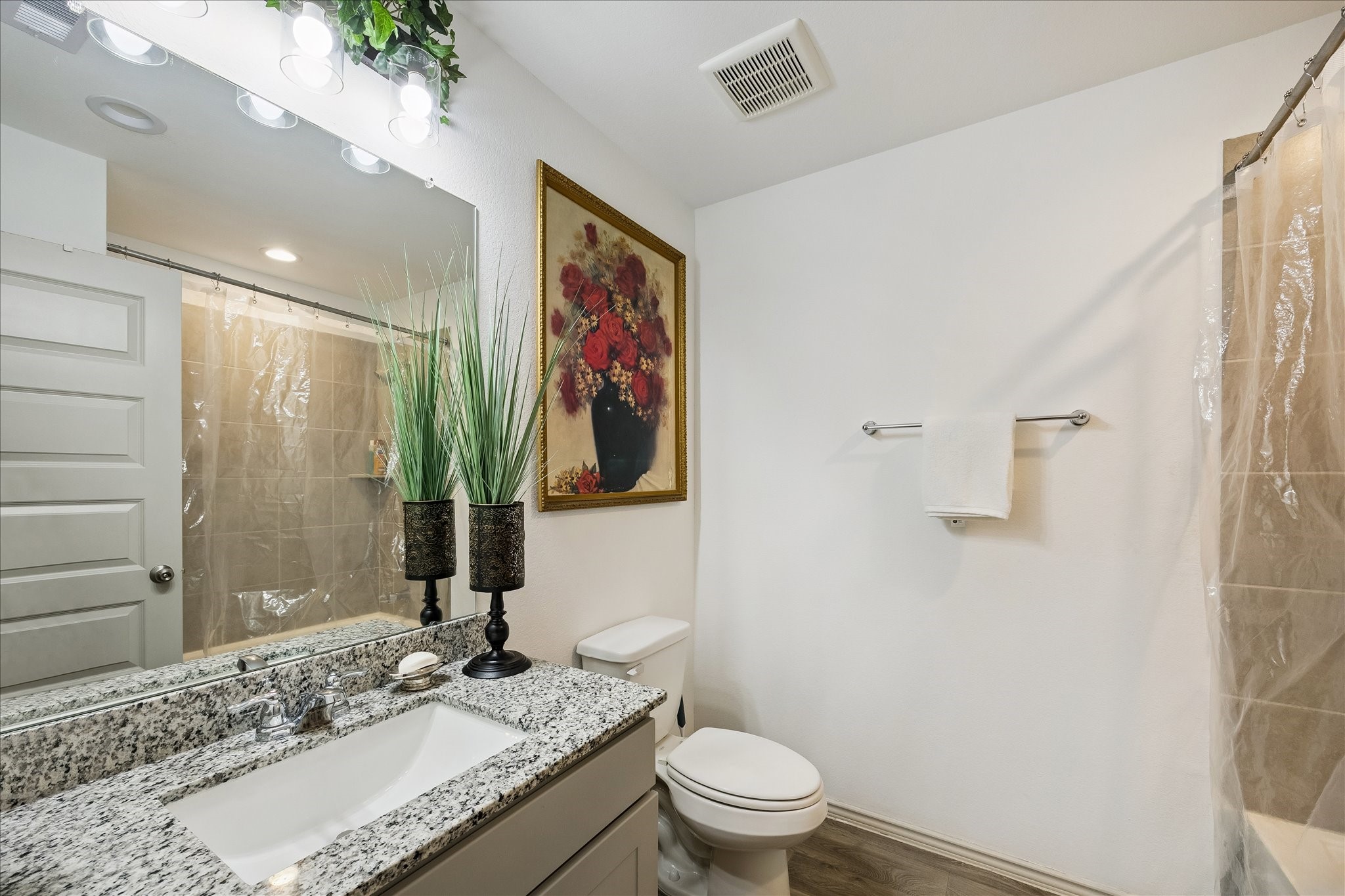 1237 Waterside Trace Sealy, TX 77474 - Photo 11 of 18 a bathroom with a granite countertop sink toilet and shower
