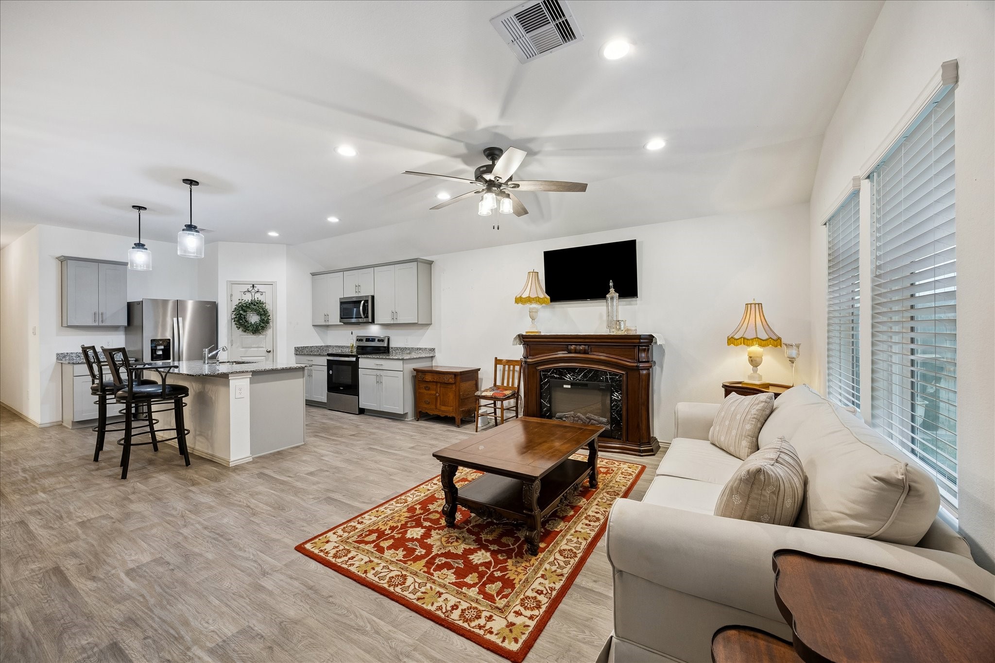1237 Waterside Trace Sealy, TX 77474 - Photo 3 of 18 a living room with furniture and a fireplace