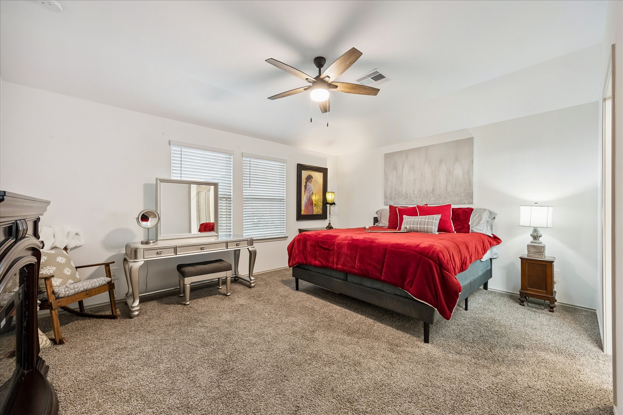 1237 Waterside Trace Sealy, TX 77474 - Photo 4 of 18 a bedroom with a bed and a chandelier