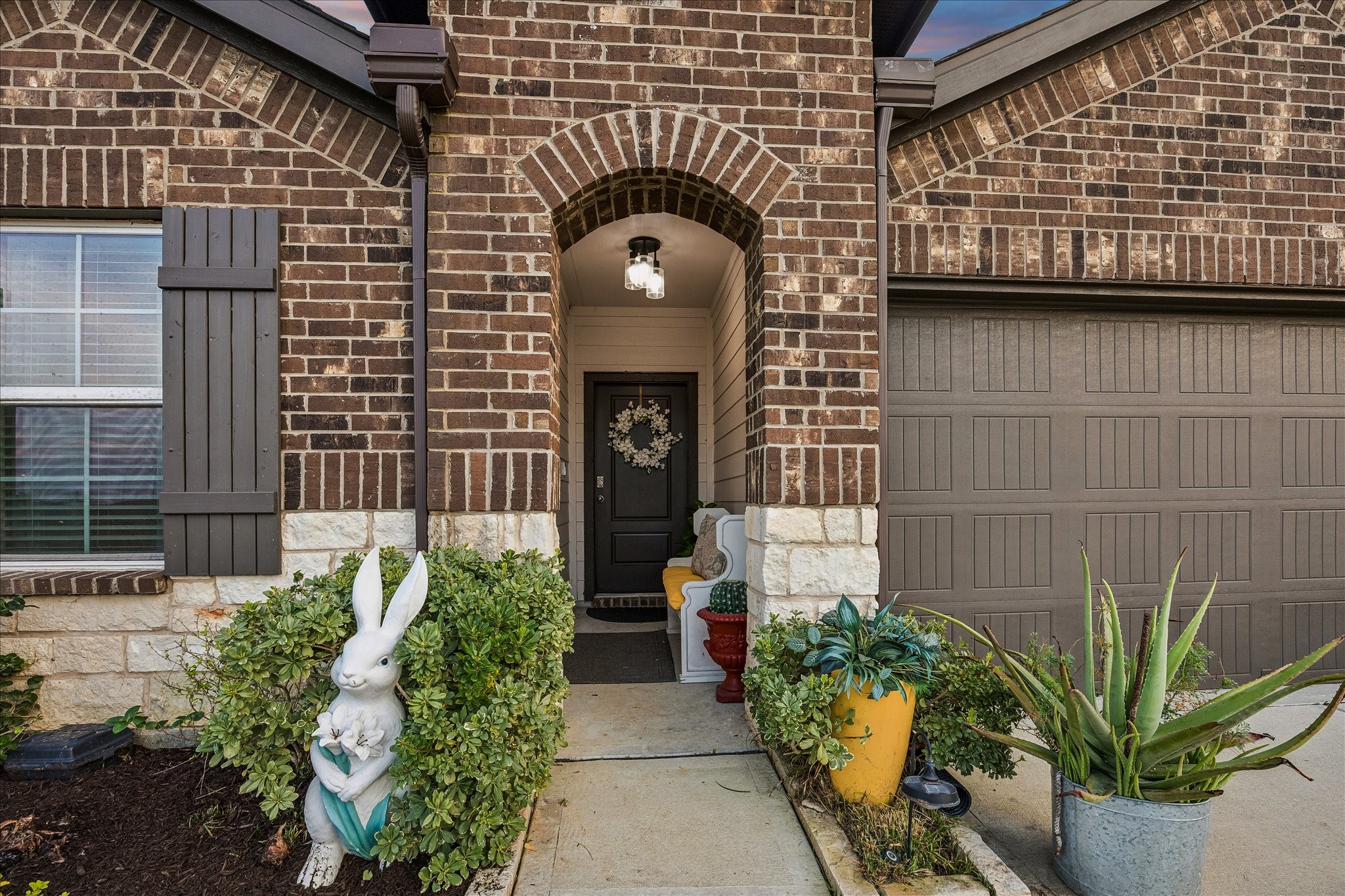 1237 Waterside Trace Sealy, TX 77474 - Photo 6 of 18 a front view of a house with garden