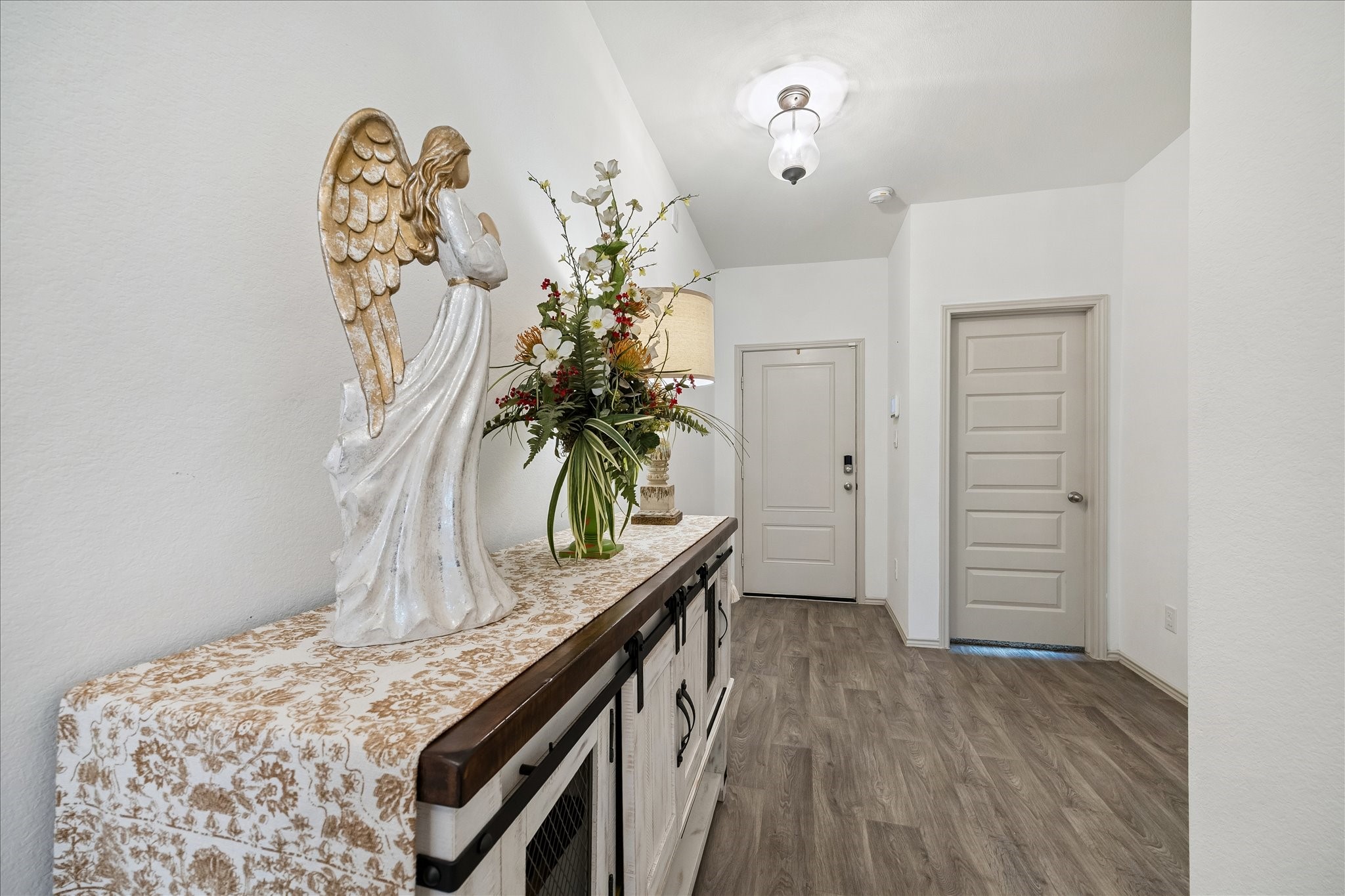 1237 Waterside Trace Sealy, TX 77474 - Photo 7 of 18 a view of a room with wooden floor and closet