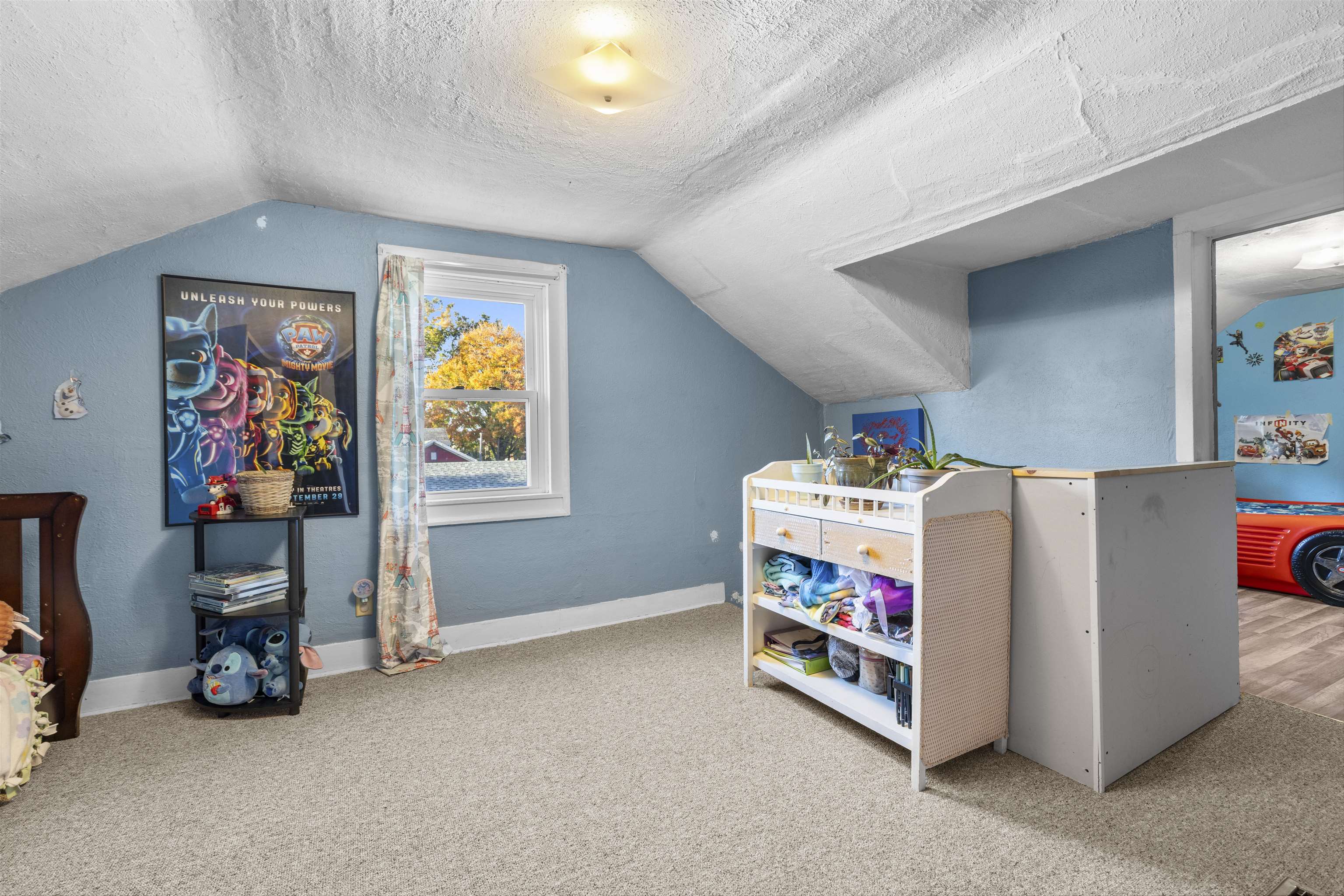 411 South Walnut Avenue Forreston, IL 61030 - Photo 15 of 19 a living room with furniture and a window