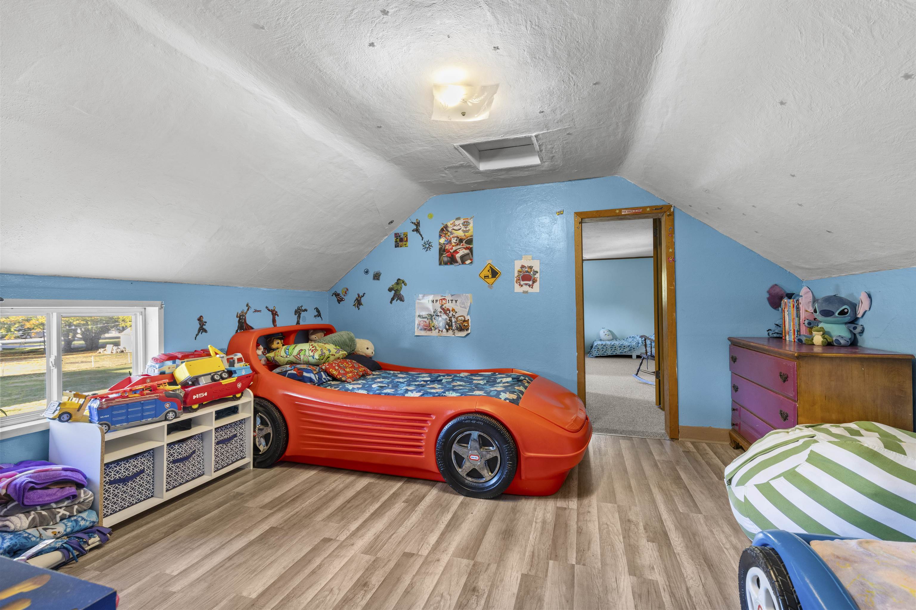 411 South Walnut Avenue Forreston, IL 61030 - Photo 18 of 19 a bedroom with bed and a wooden floor