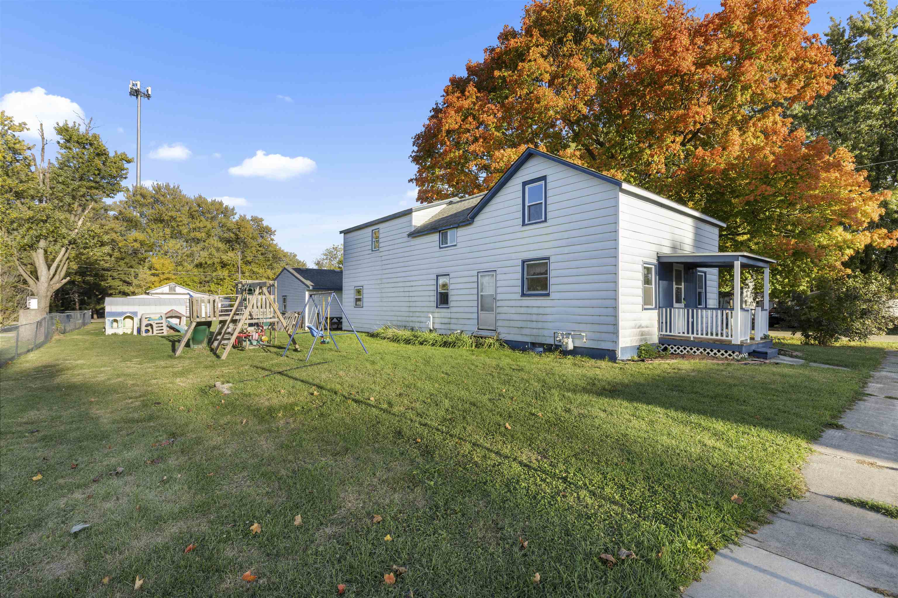 411 South Walnut Avenue Forreston, IL 61030 - Photo 2 of 19 a house view with a garden space