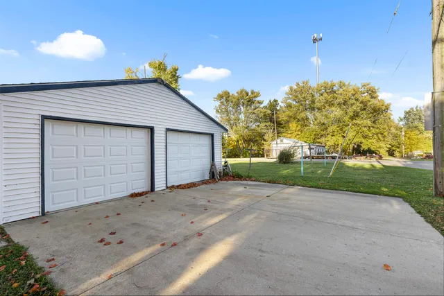 a view of a house with a garage