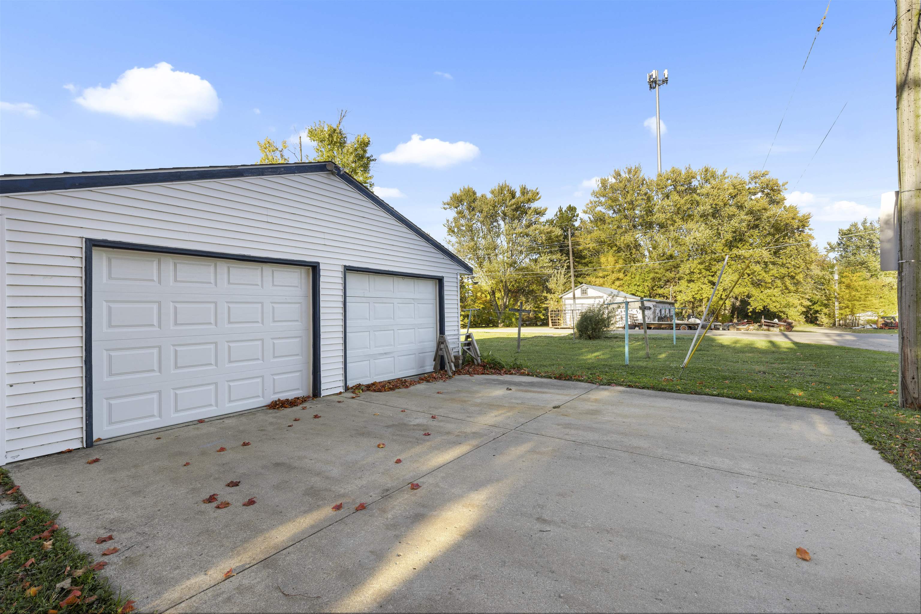 411 South Walnut Avenue Forreston, IL 61030 - Photo 4 of 19 a view of a house with a garage