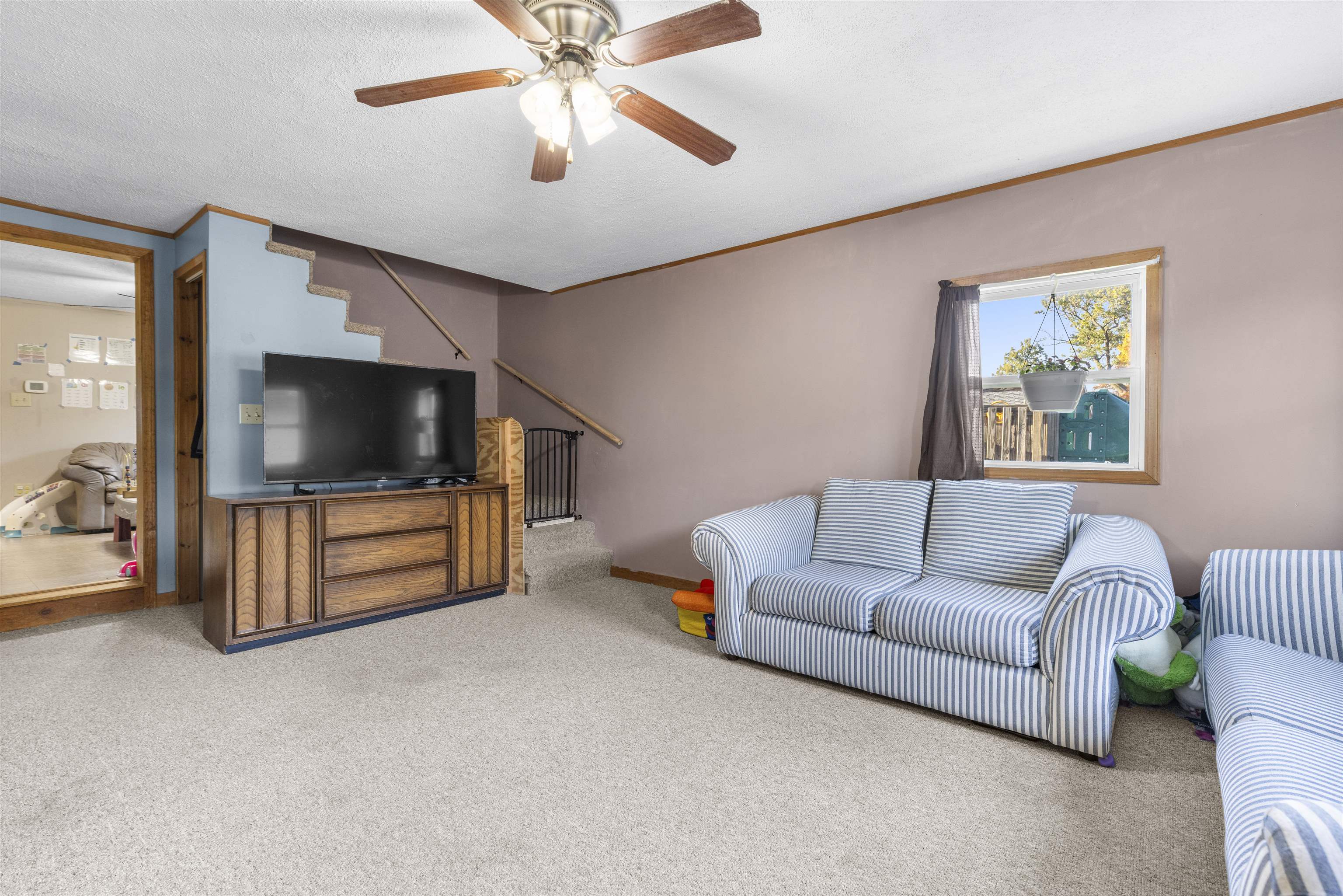411 South Walnut Avenue Forreston, IL 61030 - Photo 5 of 19 a living room with furniture and a flat screen tv