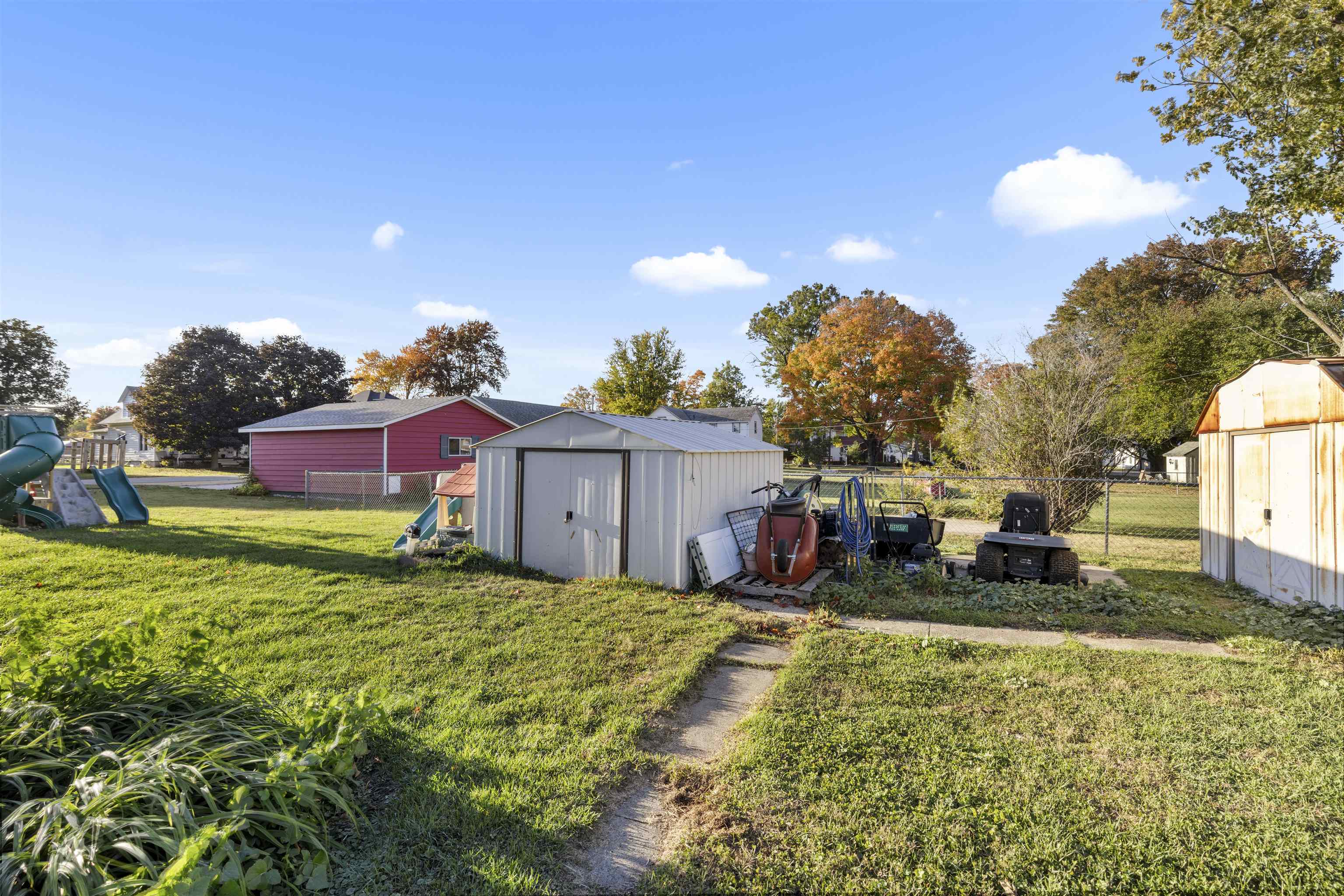 411 South Walnut Avenue Forreston, IL 61030 - Photo 8 of 19 a view of a house with a yard