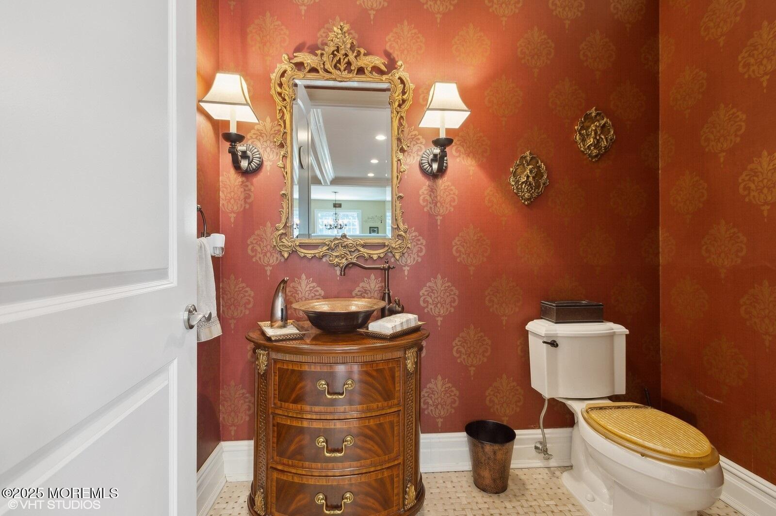 100 Richdale Road Colts Neck, NJ 07722 - Photo 13 of 31 a bathroom with a toilet mirror and vanity