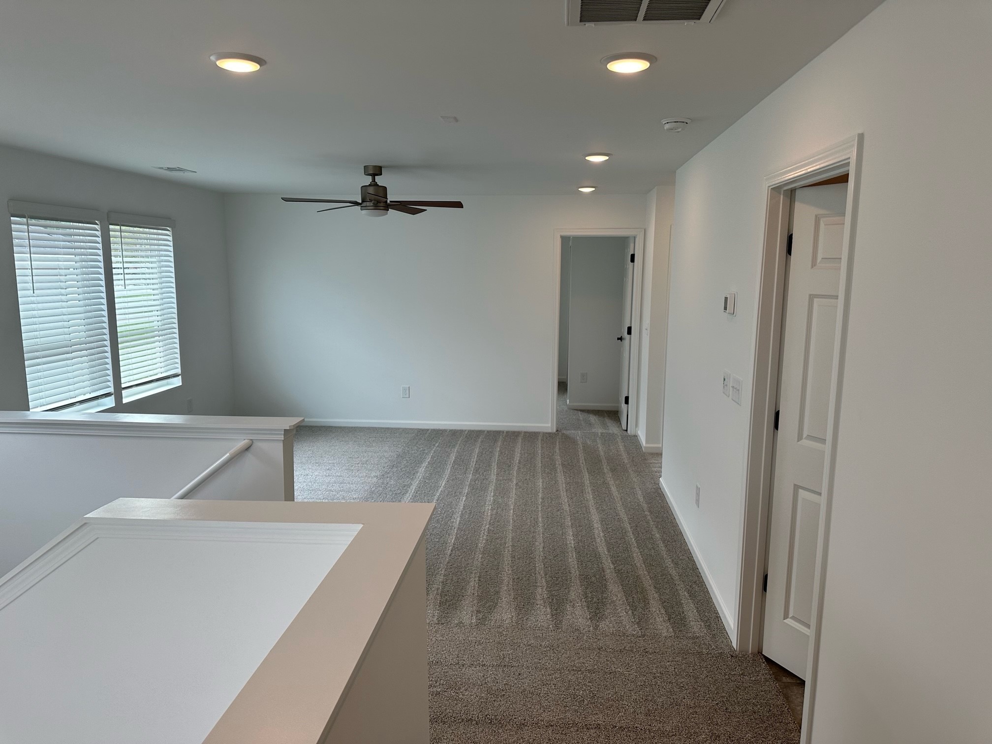 127 Timber Crest Trail White Bluff, TN 37187 - Photo 13 of 22 wooden floor in an empty room with a window