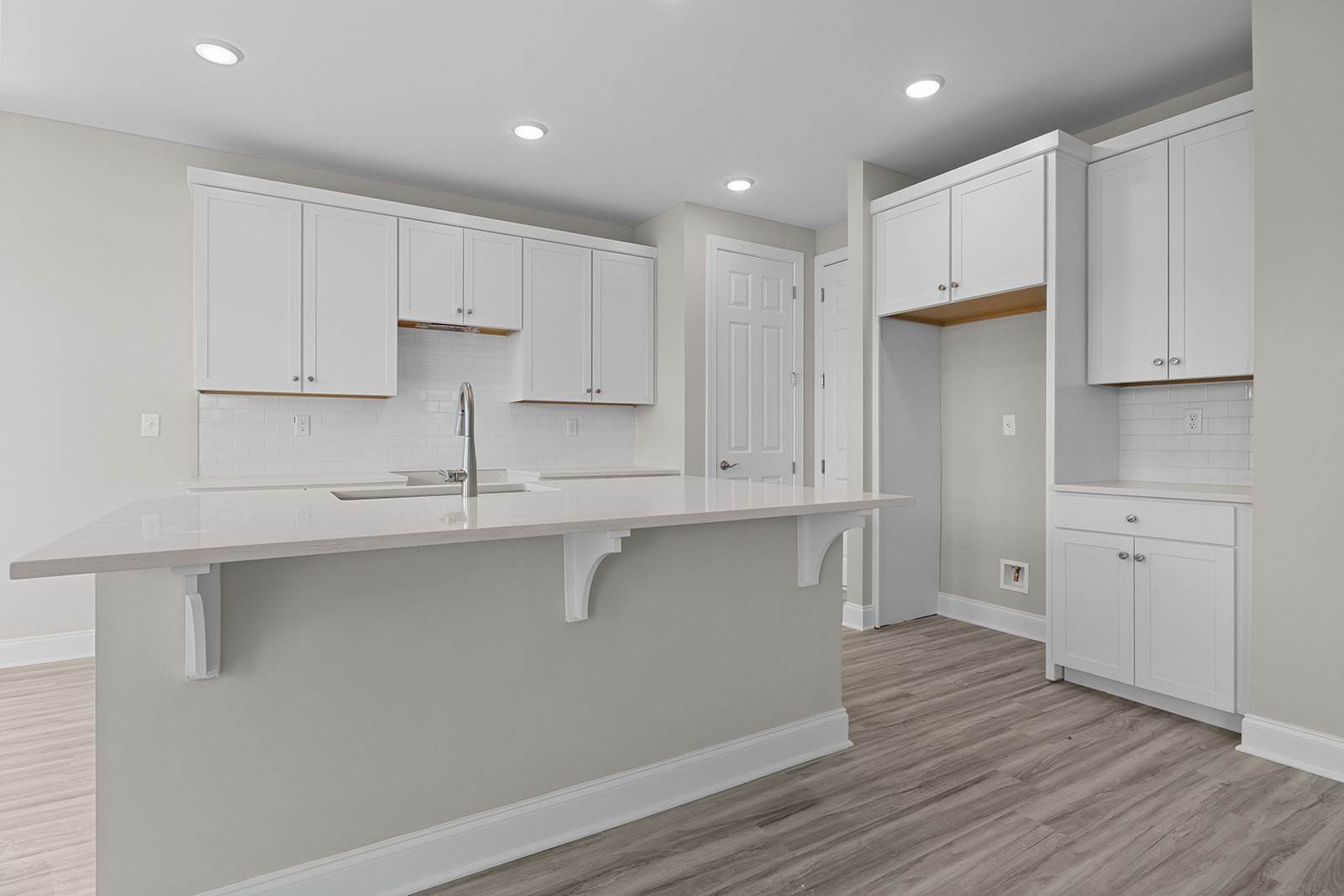 127 Timber Crest Trail White Bluff, TN 37187 - Photo 6 of 22 a kitchen with white cabinets and a stainless steel appliances