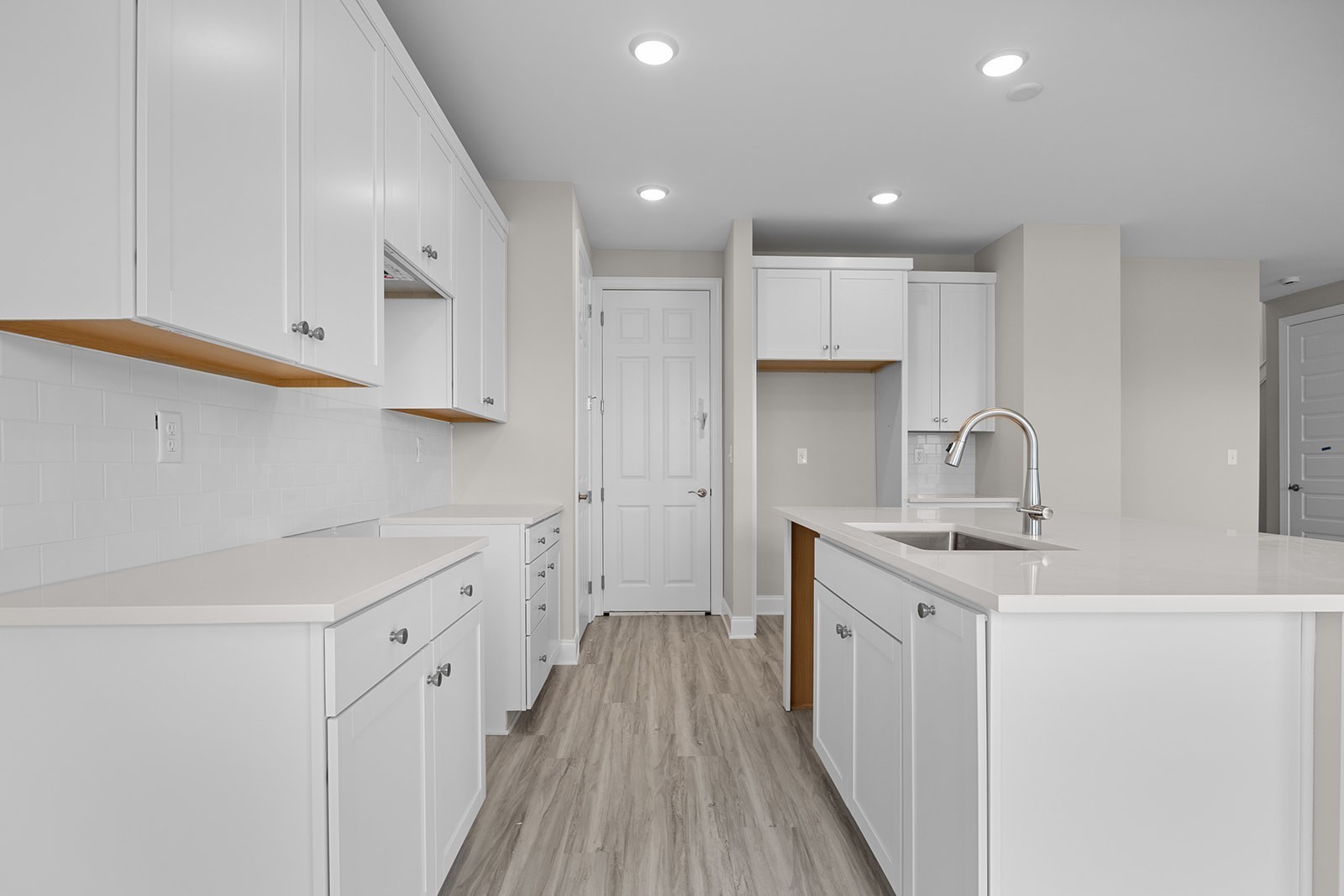 127 Timber Crest Trail White Bluff, TN 37187 - Photo 7 of 22 a kitchen with a sink stove and cabinets