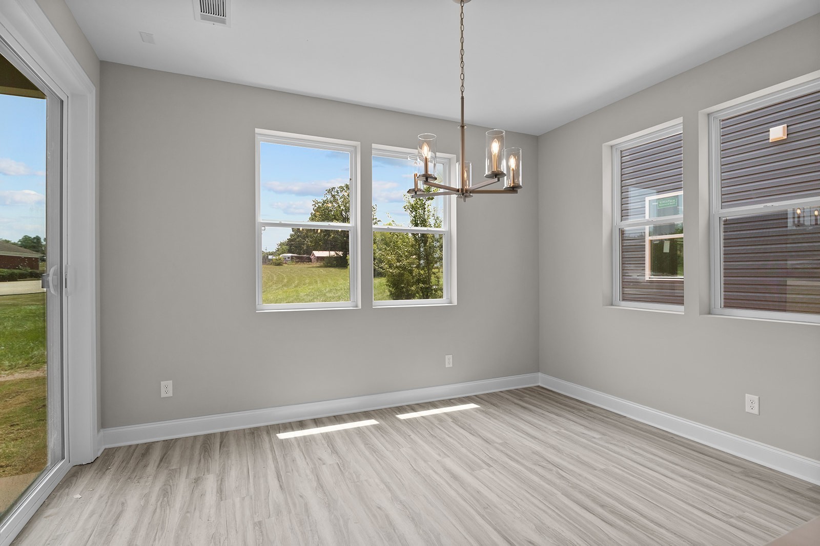 127 Timber Crest Trail White Bluff, TN 37187 - Photo 10 of 22 wooden floor in an empty room with a window