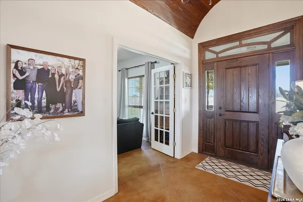 a view of a hallway and interior of house