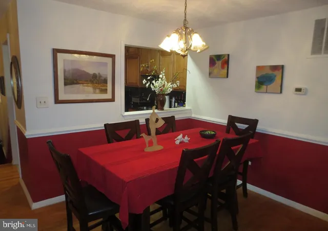 a living room with furniture fireplace and flat screen tv