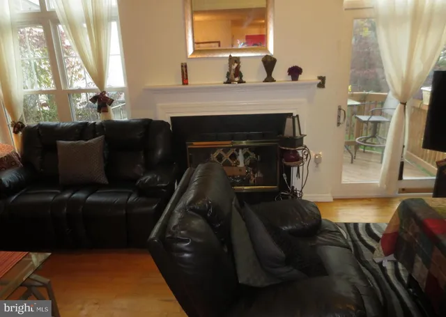 a balcony with wooden floor