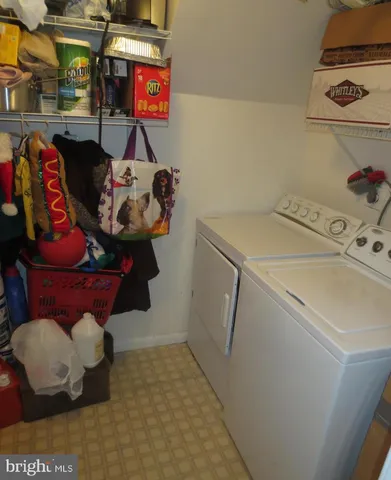 a living room with furniture fireplace and flat screen tv