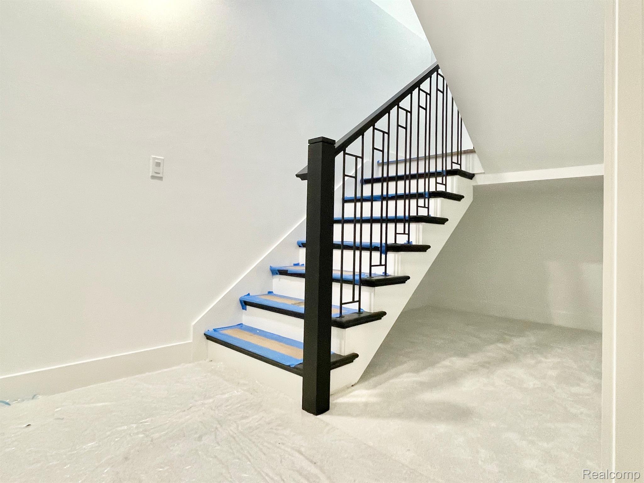 357 Maywood Avenue Rochester, MI 48307 - Photo 43 of 55 Basement stairway, carpeted landing
