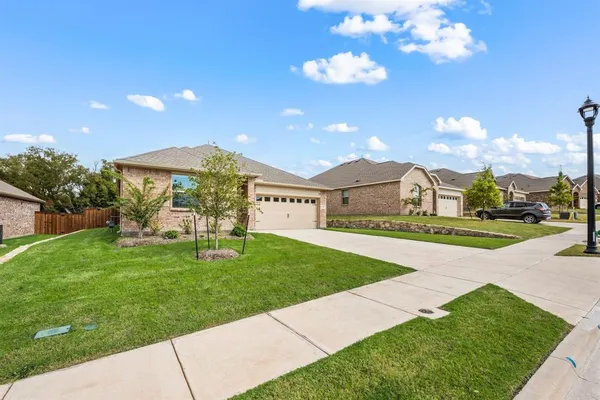 a view of a house with a big yard