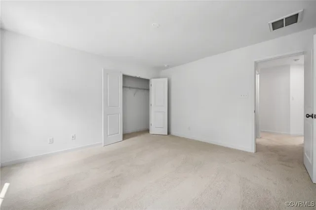 an empty room with an entryway