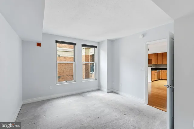 an empty room with windows