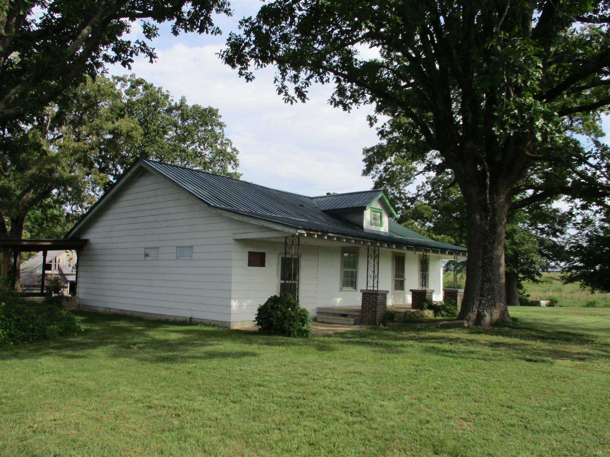 29 Owens Road Five Points, TN 38457 - Photo 1 of 26 a front view of house with yard and green space
