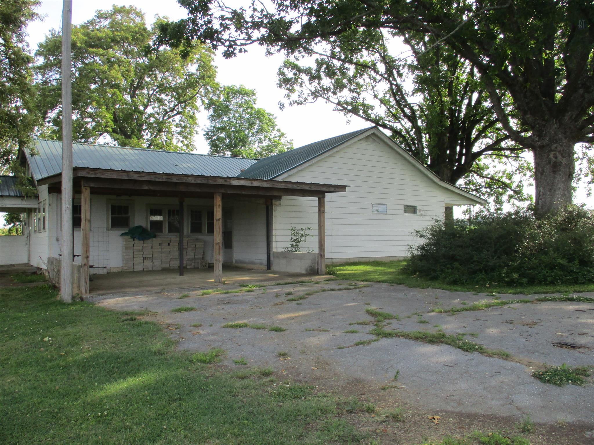 29 Owens Road Five Points, TN 38457 - Photo 2 of 26 a view of a house with a yard and large tree
